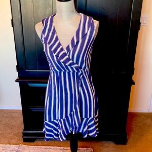 Cute navy/white striped dress. Ruffle front. Elastic waist. Pullover. Size S.